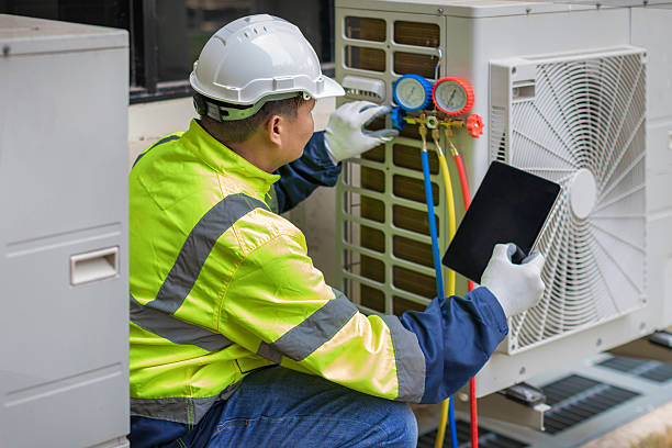 Professional Air Conditioning Repair technician working in King Ferry, NY